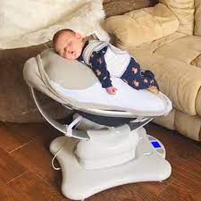 A rocking chair is a perfect spot to cuddle and soothe your baby while feeding. The Best Assistant In A New Parent S Life Baby Rocking Chair Baby Rocking Chair Baby Crying Parent Life