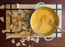 cheesy seafood fondue forks in orbit