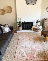 layering rugs over jute can add texture