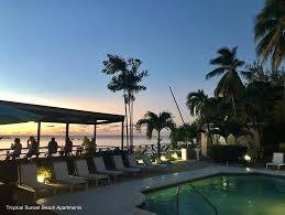 Paradise nature, palm tree on the tropical beach. Tropical Sunset Beach Apartment Hotel Saint James Updated 2021 Prices