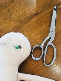how to embroider eyes on a cloth doll