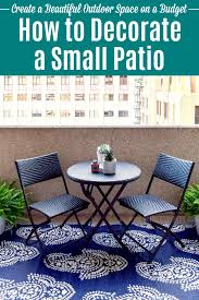 The dining table features a table top in light brown wood finishing, which matches the finish of the chair backs and seats. How To Decorate A Small Patio On A Budget Hello Little Home