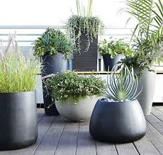 grey and black planters of various