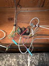 I'm trying to find my doorbell transformer to see if I can install a video  doorbell. Have a very old house. Think one of these wires may be doorbell.  Does anyone know