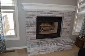 how to whitewash brick our fireplace
