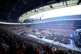 filling wembley stadium with and