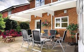 A retractable patio awning or retractable sunshade offers the luxury of providing shade or full sun depending on your personal preference. Patio Canopies Awnings Garden Canopies Canopies Uk