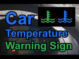 blue rature sign on car dashboard