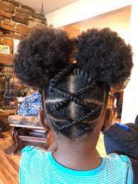 There are thin braids arranged in a square and a large bun is presented on the back of the scalp. Zig Zag Braids 1 Choice Afro Natur Cool Braid Hairstyles Black Kids Hairstyles Girls Natural Hairstyles