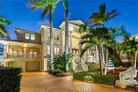 a bayway isles mansion on a point lot