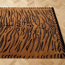 isla copper black tiger print area rug