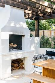 White Stucco Outdoor Fireplace