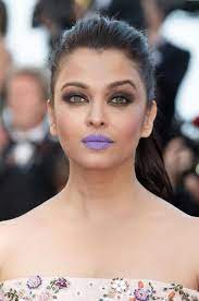 wearing purple lipstick