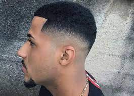 low fade hairstyles for curly haired men