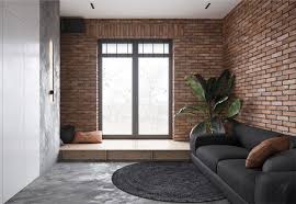 exposed brickwork and copper cladding