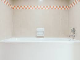how to install adhesive tub or shower
