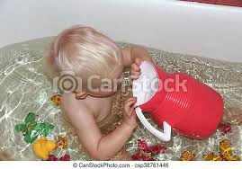 Hd00:29father bathing newborn baby in a baby bath, male hands holding 1 month old newborn baby boy in clean water in the bath closeup. Blonde Baby Boy In Bathroom Baby Boy Plays With A Pitcher Sitting In The Bath Canstock