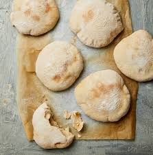 Home made pittas are the best. Pitta Patter Yotam Ottolenghi S Recipes For Homemade Pitta With Chicken Skewers Or Herb Fritters Food The Guardian