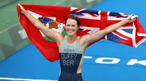 Boulder's flora duffy of bermuda celebrates after crossing the finish line to win the gold medal in the women's individual triathlon competition at the 2020 summer olympics, tuesday, july 27. Chamhql6bgbplm