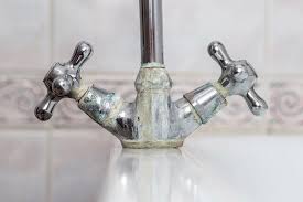 repair or change a kitchen tap which