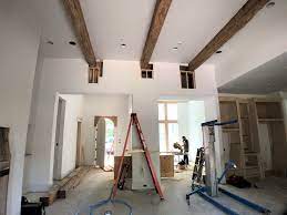 installing reclaimed wood beams