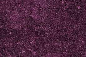 purple fluffy carpet texture of textile