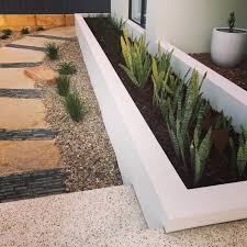 Rendered Brick Raised Garden Beds With