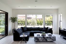 White minimalist living room interior design inspiration. 29 Minimalist Living Room Ideas How To Use Minimalism In Living Rooms Apartment Therapy