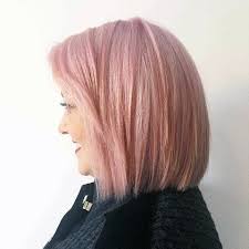 She had long, wavy black hair that was pulled back into a bun above her head with a sliver of it. 9 Ways Grown Ups Can Pull Off The Fun Pink Hair Trend Pink Hair For Grown Ups
