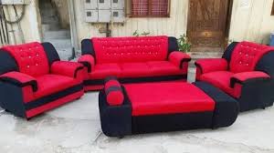 red and black sofa set with teapai