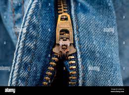 Closeup of zipper in blue jeans. Zipper with lock. A piece of denim Stock  Photo - Alamy