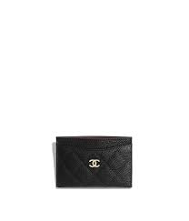 Maybe you would like to learn more about one of these? Grained Calfskin Gold Tone Metal Black Classic Card Holder Chanel