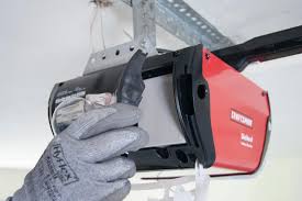 replace a garage door opener battery