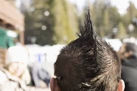 The mohawk (also referred to as a mohican) is a hairstyle in which, in the most common variety, both sides of the head are shaven, leaving a strip of noticeably longer hair in the center. Native American Boy Disciplined For Mohawk Hairstyle Popsugar Family