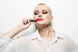 portrait of bald with red lipstick