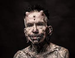 Body modification (or body alteration) is the deliberate altering of the human anatomy or human physical appearance.1 it is often done for aesthetics, sexual enhancement, rites of passage. 516 Body Modifications And Counting German Man With A World Record For Most Body Modifications Prag News