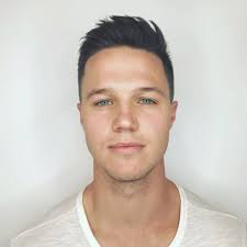 Section hair on desired side. Short Fade Cut With Messy Brushed Up Texture On Black Hair The Latest Hairstyles For Men And Women 2020 Hairstyleology