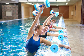 middle aged women do aqua aerobics