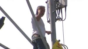 Man In Custody After Six Hours Atop A Cell Tower