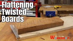 to flatten warped boards on your planer