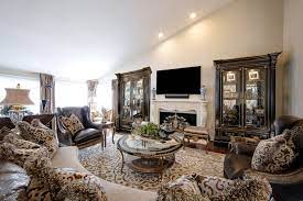 The intricate carvings on the frames of the furniture enhance by manifold the beauty of your living room set. Marge Carson Luxury Family Room Linly Designs