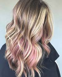 The spacing of the color allows it to be noticed without completely stealing the show from the lighter shade and deeper undertone. 21 Chic Ways To Wear Pink Highlights This Season Stayglam Pink Blonde Hair Blonde Hair With Pink Highlights Pink Hair Highlights