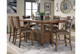In my attached pictures i have a regular height rectangle table and a couch. Royard Counter Height Dining Table And 6 Barstools Set Ashley Furniture Homestore