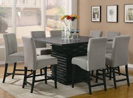 Set the table and enjoy the meal accompanied by candlelight. Coaster Stanton 9 Piece Table And Chair Set Standard Furniture Pub Table And Stool Sets