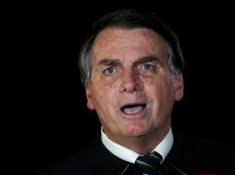 An ambulance takes brazil's president jair bolsonaro from the armed forces hospital where he had been admitted, to an airbase to be airlifted to sao pualo, in brasilia, brazil, wednesday, july 14. Jair Bolsonaro Under Fire As Brazil Hits 300 000 Coronavirus Deaths Business Standard News