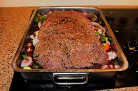 A Moose Brisket On A Bed Of Vegetables In A Roasting Pan Stock ...