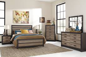 Take the hard part out of coordinating your bedroom furniture with one of coleman furniture's bedroom sets. Harlinton Queen Panel Bed With Dresser Mirror And Nightstand Ashley Furniture Homestore