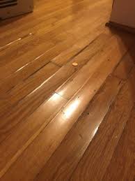 how to fix hardwood floor buckling