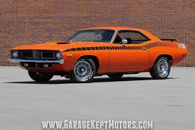 Maybe you would like to learn more about one of these? 1973 Plymouth Aar Cuda Garage Kept Motors