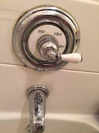 How do I remove this shower handle? No set screw. Hot water is not as hot  as the rest of the faucets. : r/Plumbing